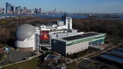 an aerial view of a building with a city in the background at 1A Prime Area Near NYC and EWR 98 Walk score in Newark