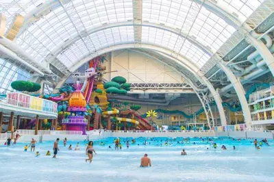 a group of people in a water park at 2C - Parking Cred, Early CI, King Bed, Sleeps 6 - 30mins to NYC in Newark