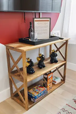a wooden shelf with some toys on it at 1C - Ask About 20Off - Sleeps 5 - Airport 8min - NYC 30min in Newark