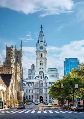 a large building with a clock tower on top of it at Luxe City Hall Suite by Rittenhouse Square in Philadelphia