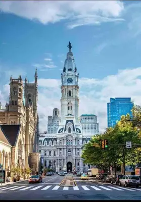 a large building with a clock tower on top of it at New - Suite nearby Rittenhouse Square in Philadelphia