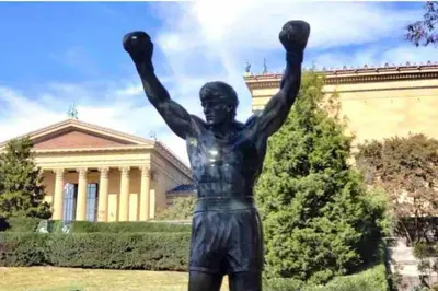 a statue of a man with his arms in the air at NEW - 1 Bedroom near Rittenhouse Square in Philadelphia