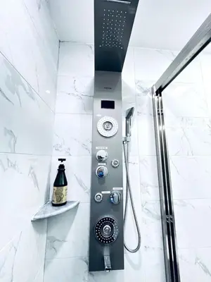 a shower in a bathroom with a shower at New - Suite close by Rittenhouse Square in Philadelphia