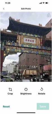 a picture of a building with a sign on a street at Lovely 1BD Apt Near Magic Garden in Center City in Philadelphia