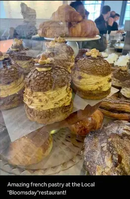 a display of different types of pastries in a bakery at Rittenhouse Square near Kimmel Center 1BD in Philadelphia