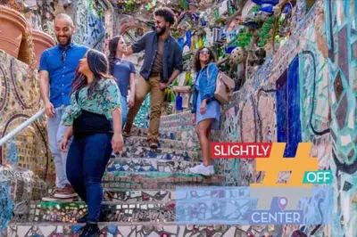 a group of people walking down stairs in a mural at Rittenhouse Square near Kimmel Center 1BD Suite in Philadelphia