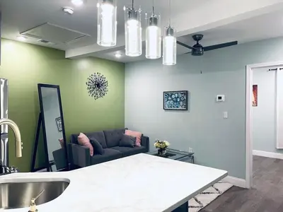 a living room with a couch and a table at Rittenhouse Square nearby Kimmel Center 1BD in Philadelphia