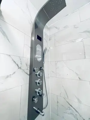 a bathroom with a shower with a glass door at Rittenhouse Square nearby Kimmel Center 1BD in Philadelphia