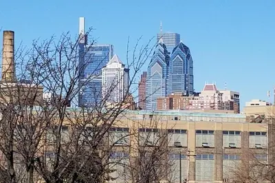 a city skyline with tall buildings in the background at Beautiful 1BD Apt with Roofdeck in Passyunk Square in Philadelphia