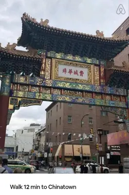 an arch with a chinese sign on a city street at Downtown City Hall near Rittenhouse Square 1 BD in Philadelphia
