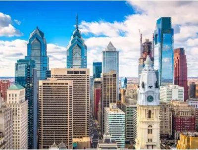 a view of a city skyline with a clock tower at Downtown City Hall near Rittenhouse Square 1 BD in Philadelphia