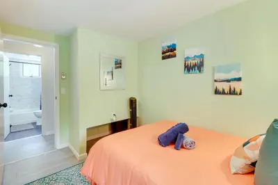a bedroom with a blue teddy bear sitting on a bed at Community Pools and Hot Tub Albrightsville Cottage! in Albrightsville