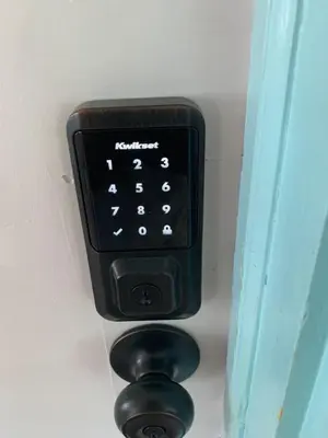 a black remote control hanging on a wall at Newly Renovated 2 BR downtown Apt, family getaway. in Montclair