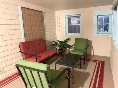 a room with three chairs and a table at Lovely 1 BD downtown 2F apt in quite neighborhood in Montclair
