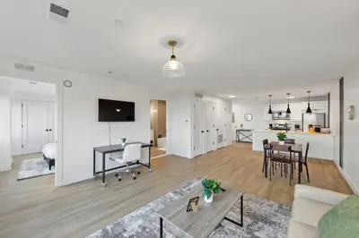 an open living room with a dining room and kitchen at Market View Residence in Wilmington