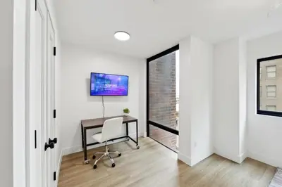 a home office with a desk and a window at Market View Residence 601 I 1 Bedroom 1 Bathroom in Wilmington