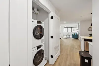 a laundry room with two washer and dryer at Market View Residence 601 I 1 Bedroom 1 Bathroom in Wilmington