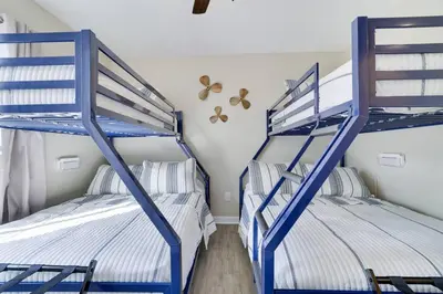two twin bunk beds in a room with at The Hawley Nook at Lake Wallenpaupack in Hawley