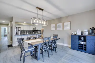 a kitchen and dining room with a table and chairs at The Hawley Nook at Lake Wallenpaupack in Hawley