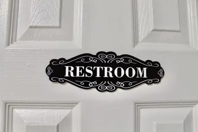 a door with a sign that reads restroom on it at Entire House in West Ny, NJ12 mints from NYCity Time Square in West New York