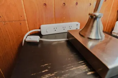 a metal table with a blender and an electrical outlet at Arrowheadlake,videogames,fireplace,firepit,grill in Thornhurst