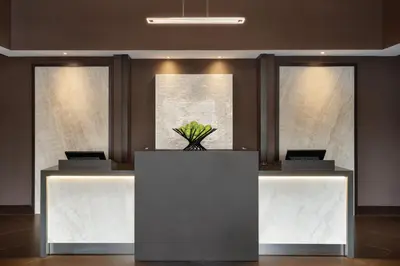 a lobby with a reception desk with a plant on it at Hyatt Place Philadelphia/ King of Prussia in King of Prussia