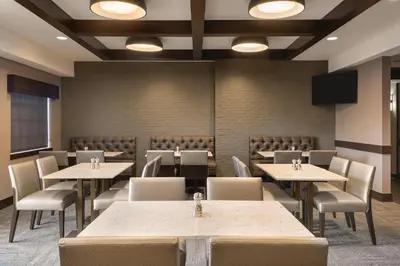 a large dining room with tables and chairs at Hyatt Place Philadelphia/ King of Prussia in King of Prussia