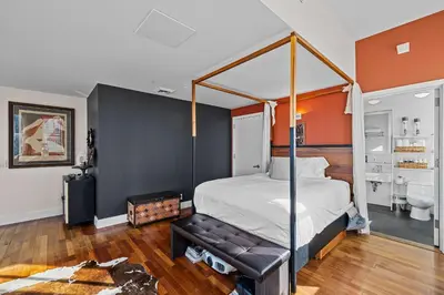 a bedroom with a bed with a canopy at Broadway Terrace by Rove Loft with Private Terrace in New York
