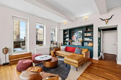 a living room with a couch and a table at Broadway Terrace by Rove Loft with Private Terrace in New York