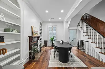 a home office with a desk and a staircase at Downing by Rove Travel Private Terrace & Patio in New York