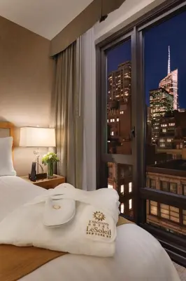 a hotel room with a view of a city skyline at Executive Hotel Le Soleil New York in New York