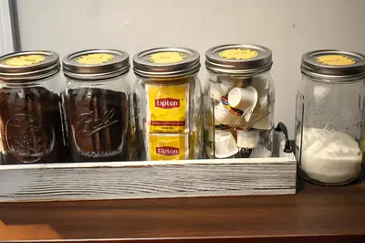 a group of jars of food sitting on a shelf at Spacious Cozy Retreat, Sleeps 10, Near NYC & EWR in Newark