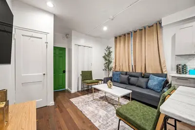 a living room with a couch and a table at New 1-BD in Prime Philly Location with King Bed in Philadelphia