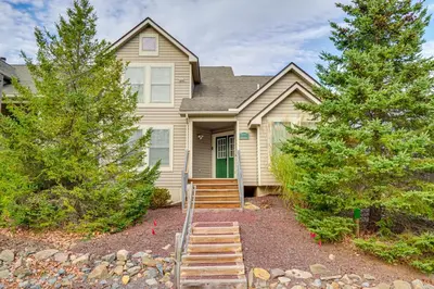 a house with trees in front of it at Spacious Modern Home about 1 Mi to Camelback Mountain! in Tannersville