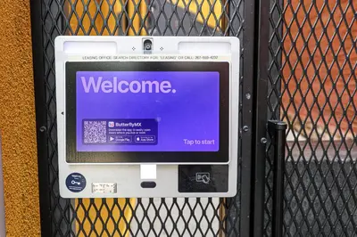 a machine with the word welcome on the screen at StudioAprt QueenBed,WiFi,WD,Parking,Gym in Philadelphia