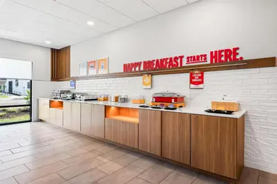 a kitchen with a counter in a restaurant at Hampton Inn & Suites Intercourse, Pa in Intercourse