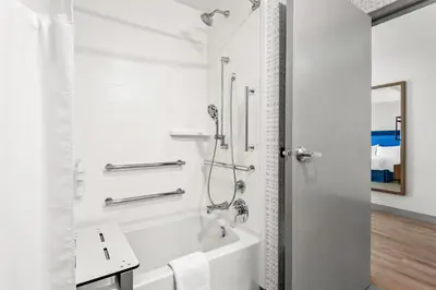 a white bathroom with a tub and a sink at Hampton Inn & Suites Intercourse, Pa in Intercourse