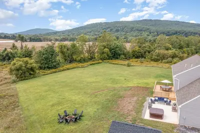 an aerial view of a large yard with a house at 10 Acre Hidden Gem in Dillsburg