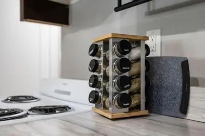 a bunch of wine bottles in a wine rack in a kitchen at The Luxe Nook, Premier Studio in Scenic Congers in Congers