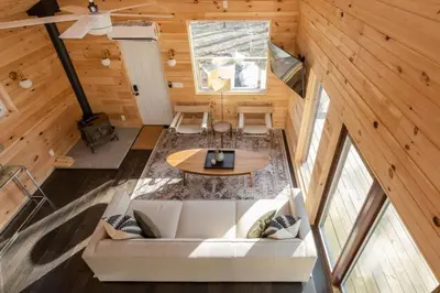 an overhead view of a living room in a cabin at Modern Rustic Tiny Home in the Catskills in Roscoe