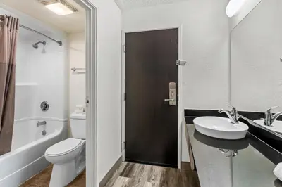 a bathroom with a toilet and a sink at Studio 6 King of Prussia PA Philadelphia in King of Prussia