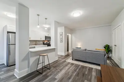 a living room with a couch and a kitchen at Fairfax 126 I 1bd1bth University City in Philadelphia