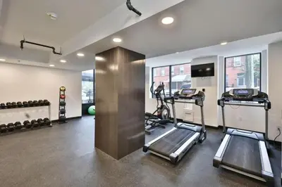 a gym with two tread machines in a room at Fairfax 126 I 1bd1bth University City in Philadelphia