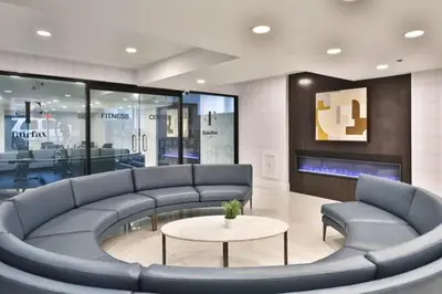 a living room with a couch and a table at Fairfax Apartments 303 Spacious 1 Bed 1 Bth in Philadelphia