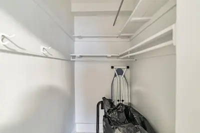 a walk in closet with white walls and a ceiling at Fairfax Apartments 425 Spacious 1 Bed 1 Bth in Philadelphia