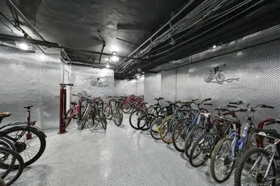 a bunch of bikes parked in a garage at Fairfax Apartments 425 Spacious 1 Bed 1 Bth in Philadelphia