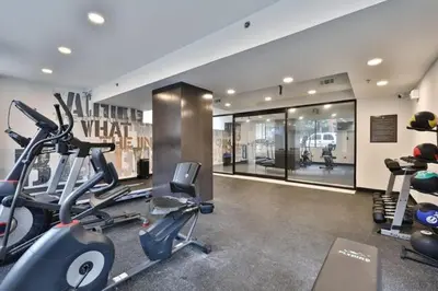 a gym with two treadmills and a treadmill at Fairfax Apartments 603 Spacious 1 Bed 1 Bth in Philadelphia
