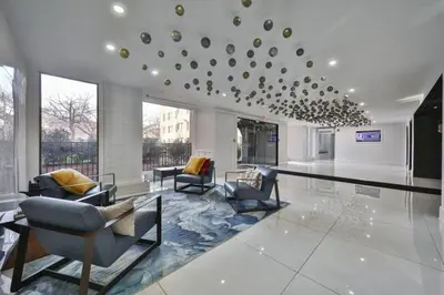 a living room with couches and chairs in a building at Fairfax Apartments 725 Spacious 1 Bed 1 Bth in Philadelphia