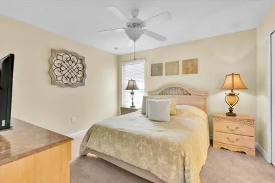 a bedroom with a bed and a ceiling fan at MYR1466 in Philadelphia