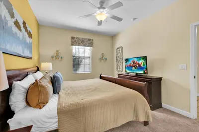 a bedroom with a bed and a flat screen tv at MYR1466 in Philadelphia
